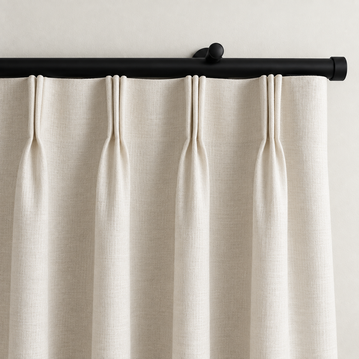 Rylan black motorized curtain rod with ivory pinch pleat curtains